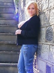 More outdoors flashing from tara sparx wearing jeans and a top